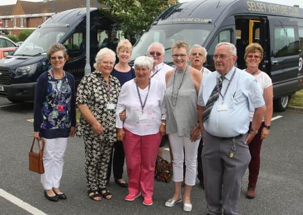 Selsey Venture Club committee members with the two new minibuses, which were dedicated at the 50th anniversary party. Photo by Derek Martin DM17630047a