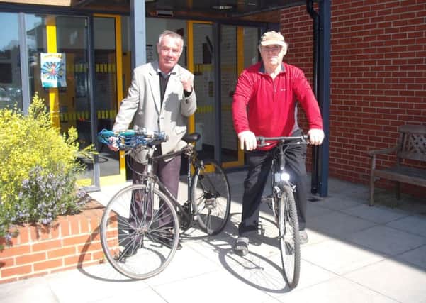 Liam Connell (right) has recruited Olympic medal-winning boxer Alan Minter to join the team of cyclists raising money for the cancer units in Worthing and Chichester.