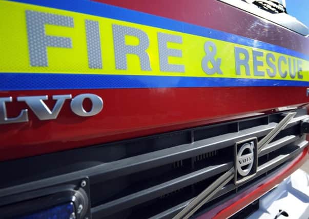 A woman was rescued from a bedroom after a blaze broke out
