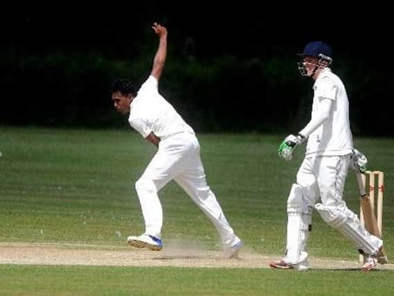 Crawley Eagles bowler Rilwan Mohammed in action against Bexhill 2nds at Cherry Lane on Saturday .
Picture by Steve Robards SR1714356