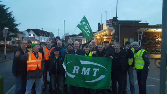 Members of the RMT union outside Horsham Railway Station (photo by the RMT). SUS-161123-093128001