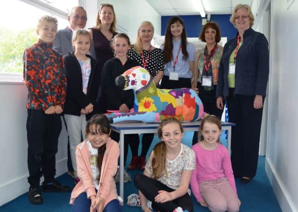 The Puppy Party and their completed snow dog with the Pallant House Gallery learning team, Seal Primary Academy's head teacher and Chichester District Council cabinet members