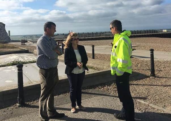 Maria Caulfield MP with Seaford County Councillor Phil Boorman (L) and HM Coastguard Senior Coastal Operations Officer Graham Easton