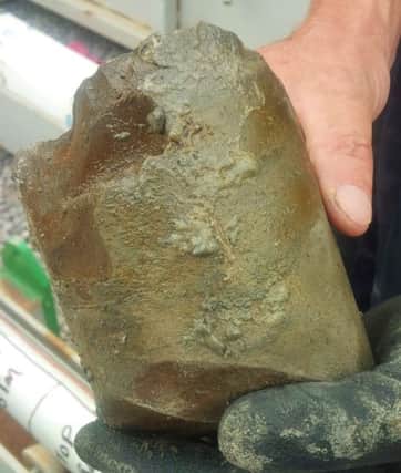An oily rock sample taken from the Broadford Bridge site near Billingshurst