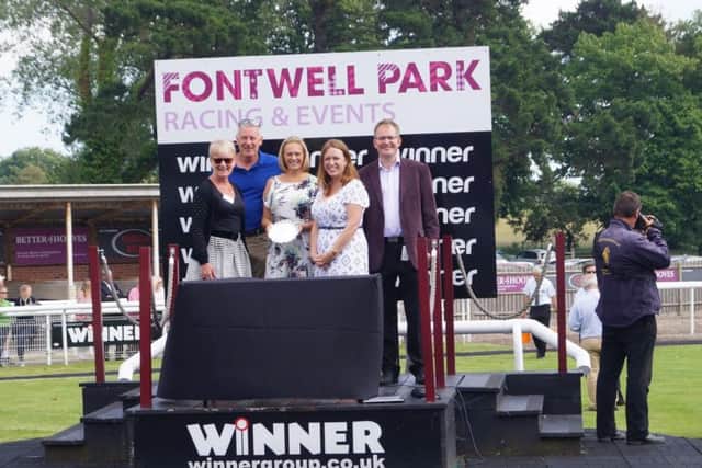 Deputy chairman Amber Foster and non-executive board member Joanne Newell presented the trophy to the winner of the Shoreham Port Handicap Chase