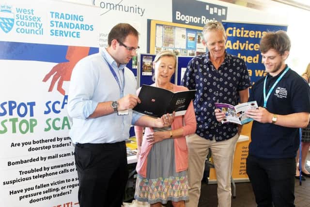 DM17632615a.jpg Scams awareness event at Tesco, Shripney Road, Bognor Regis. Kyle Cherry, left and Kyran O'Neill from Trading Standards talking to Julie Rose and Keith Hambleton. Photo by Derek Martin. SUS-170507-111413008