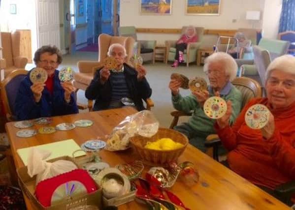 The arts and crafts group at Kingsland House in Shoreham has been making decorations for the sensory garden as part of the homes new look