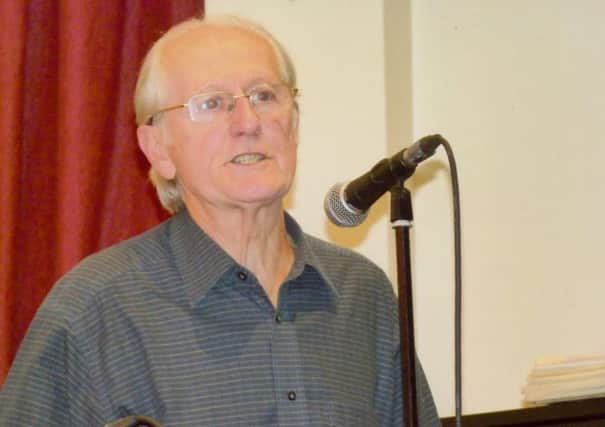 Pat Neil speaking at a reunion of staff in 2011
