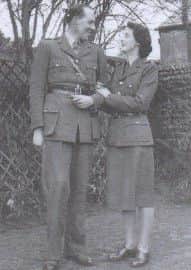 Sheila Dunlop and her husband Roy in uniform