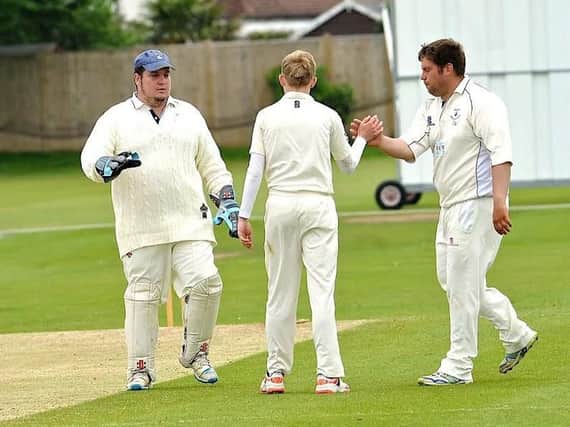 Littlehampton skipper James Askew (far, right) took four wickets on Saturday. Picture by Stephen Goodger