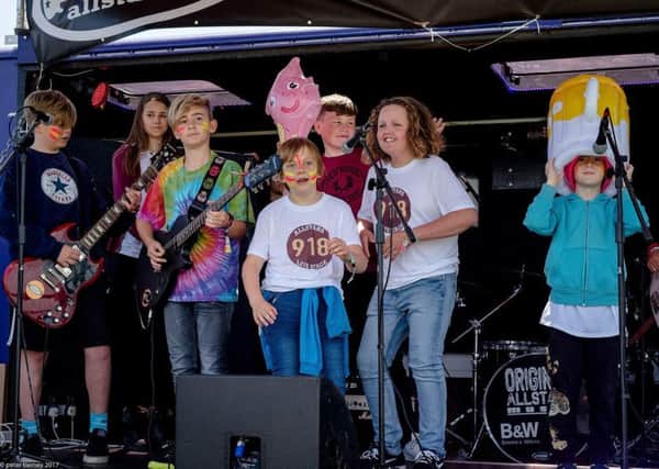 Shoreham Allstars benefited from a community grant last year and recently performed original songs at Wild Life festival