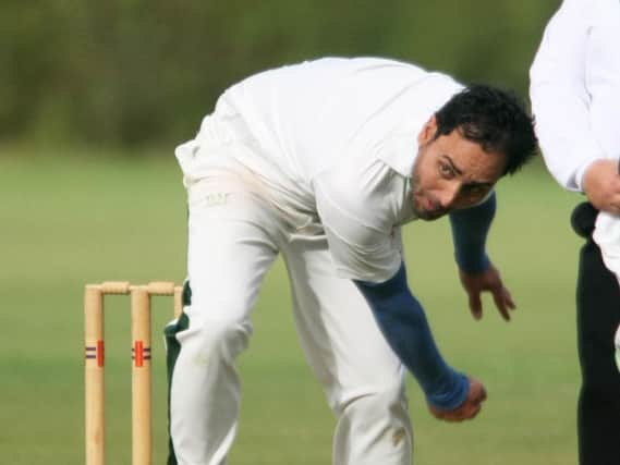 Crawley Eagles bowler Anjum Zafar took 3-35
Photo by Derek Martin