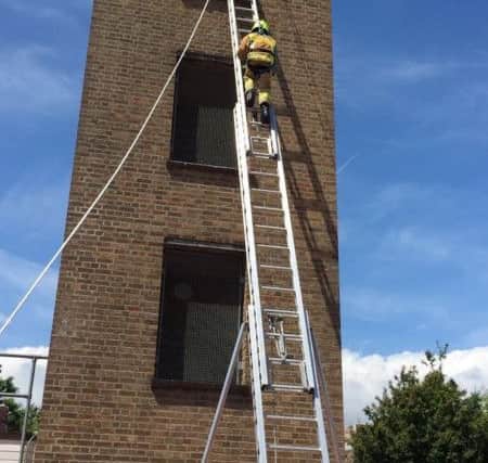 The children tried ladder climbing during the fire station event