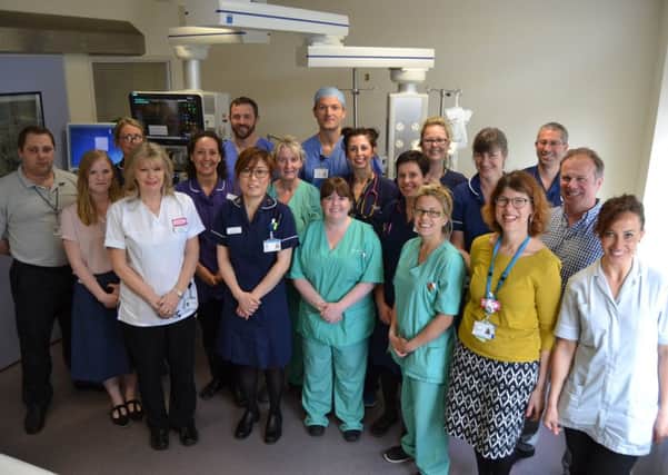 Matron for critical care Louise Skelt (fifth from right) with the critical care team at Worthing Hospital celebrating their achievements