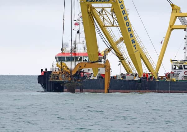 The Cormorant crane barge was brought in from the Netherlands. Pictures: Eddie Mitchell