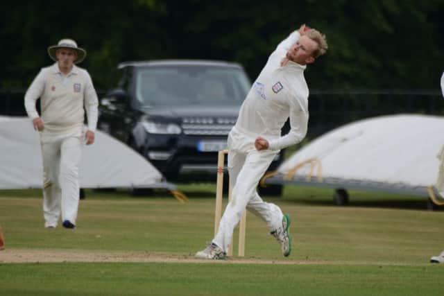 Shawn Johnson bowling for Bexhill against Cuckfield. Picture courtesy Andy Hodder