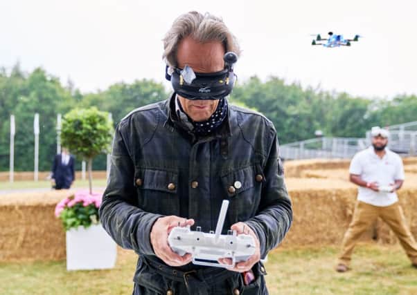 Goodwood owner Charles Gordon-Lennox, Earl of March trying his hand at flying a racing drone