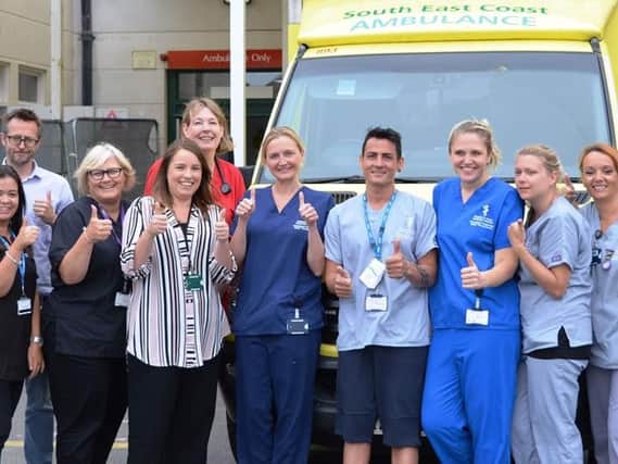 Staff give a thumbs up for the Ultimate Urgent Care Centre Campaign