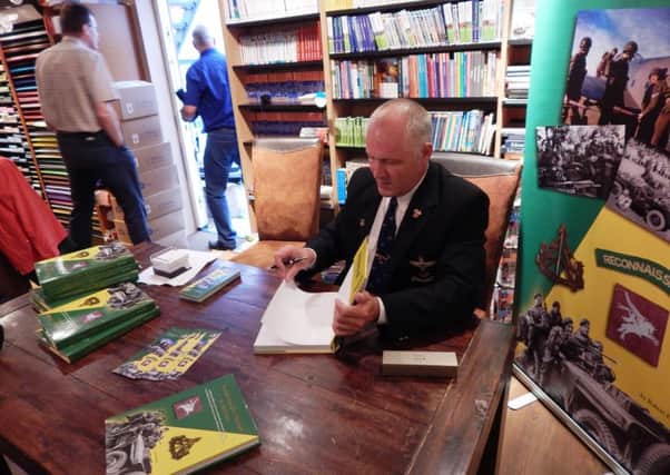 Robert Hilton signing books in Oosterbeek