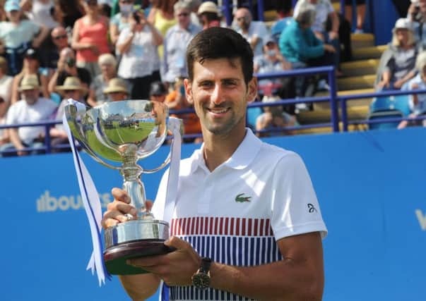 Novak Djokovic with the Aegon International Trophy - picture: Jon Rigby