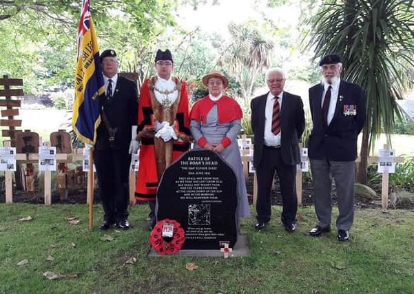 A service was held in Worthing to rmember the 22 Worthing soldiers killed on 'The Day Sussex Died' in 1916. Mayor of Worthing Alex Harman with, from left, standard bearer Merlin Jones; Pat Cook, lay reader from St Georges Church in Worthing, wearing a First World War nurses uniform; Major Brian Hudson, of the Royal Sussex Regimental Association; and councillor Tom Wye. WLe10S-JNxandRtxI8HR