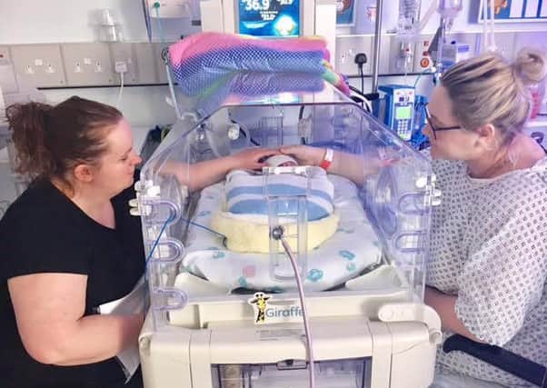 Jennifer and Alexandra in the premature baby unit with their son Arthur