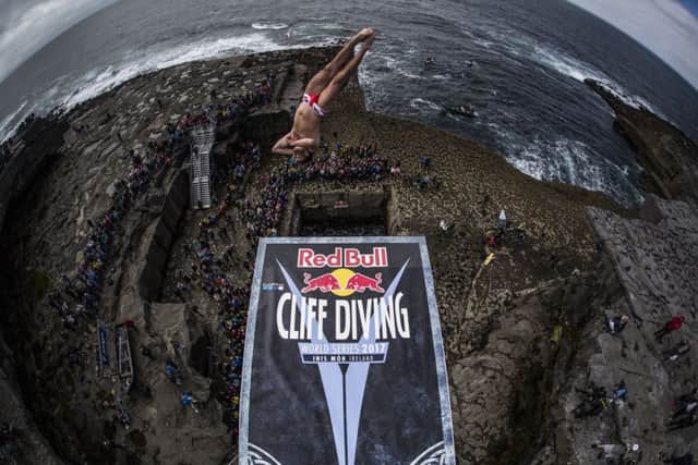 Blake Aldridge of the UK dives from the 27.5 metre platform during the first stop of the Red Bull Cliff Diving World Series at the Serpent`s Lair, Inis Mor, Ireland on June 24, 2017. // Romina Amato/Red Bull Content Pool // P-20170624-00667 // Usage for editorial use only // Please go to www.redbullcontentpool.com for further information. //