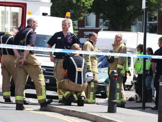 Firefighters at the scene of the fire in Brighton (Photograph: Eddie Mitchell)