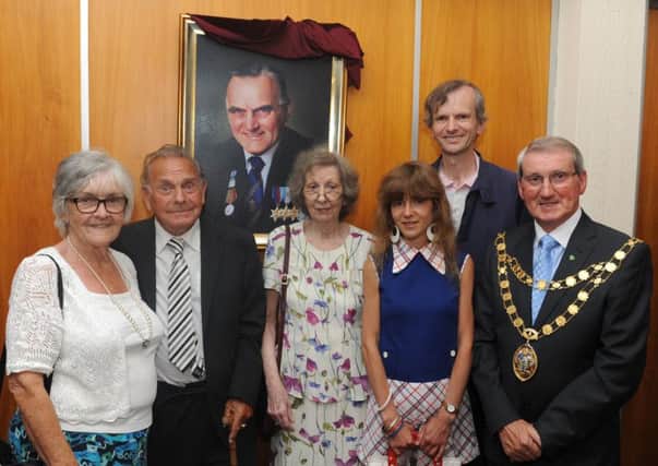 Councillors gathered at the Town Hall to unveil the portrait honouring the late Bert Crane. Picture: Jon Rigby