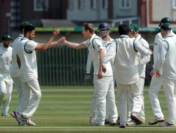 Ifield celebrate Paul Clifford taking a wicket.
Picture by Jon Rigby