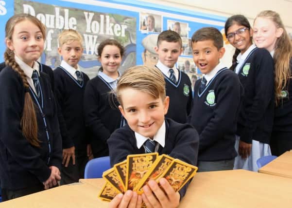 Fraser Foxwell, nine, practising at Orchards Junior School ahead of the national Top Trumps Tournament final. Photo by Derek Martin DM17632272a