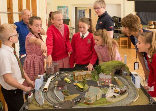 Children with the model railway