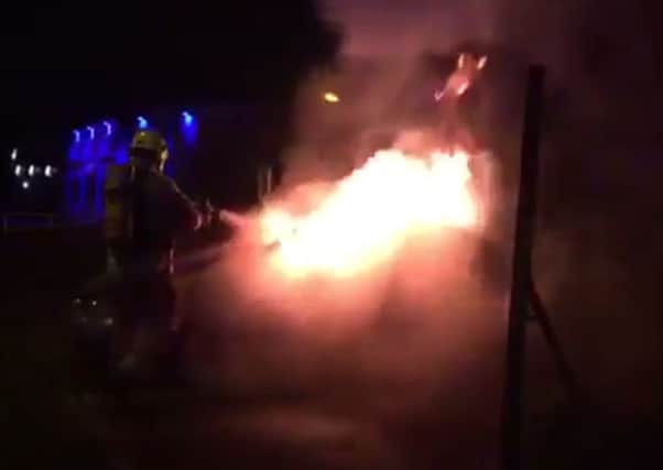 East Grinstead firefighters battle 'deliberate' car fire. Photo by East Grinstead Fire.