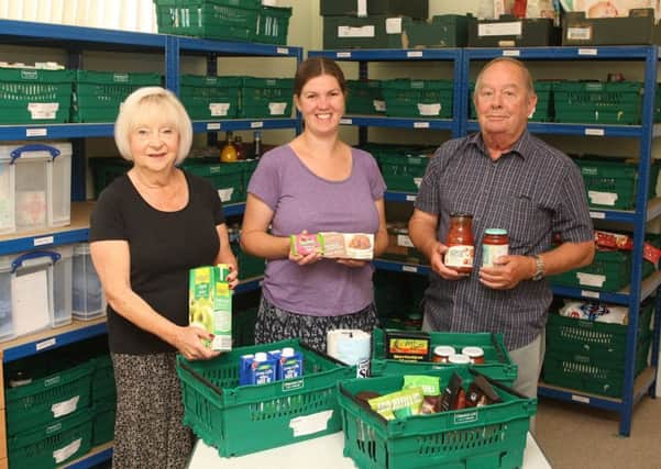 Shoreham foodbank volunteers Kathy Tomlinson, Sarah Measor and Peter Lockwood