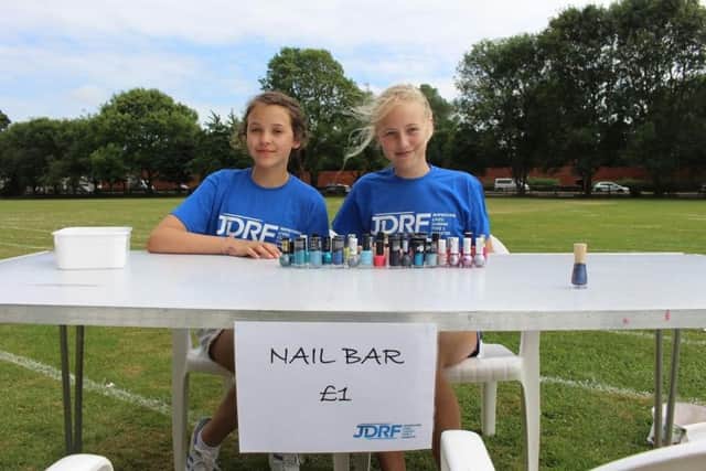 Pupils run a nail bar to raise funds