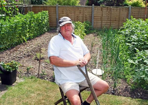 Michael Monger, 61, said he has been forced to throw away his homegrown vegetables because of the leak. Picture: Derek Martin