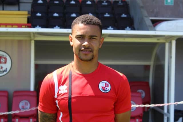 Reds' new loan signing Dennon Lewis arrives at the Checkatrade Stadium.
Picture courtesy of Crawley Town