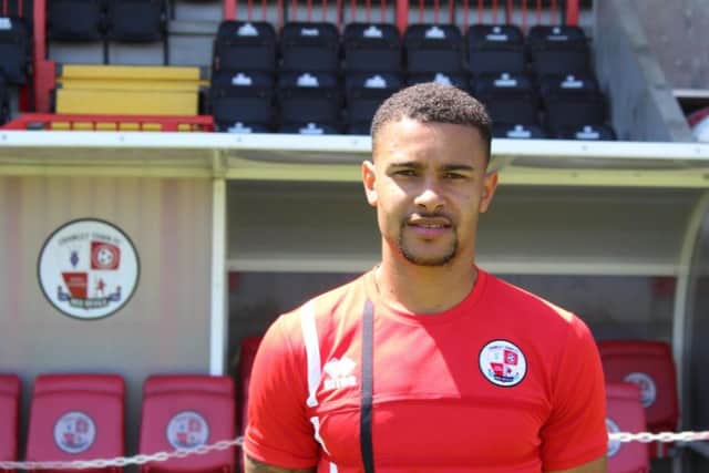 New signing Dennon Lewis arrives at the Checkatrade Stadium.
Picture courtesy of Crawley Town.