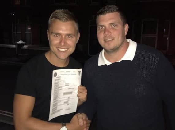 Summer signing Mitchell Hand (left) with joint player-manager Carl Stocker (right)