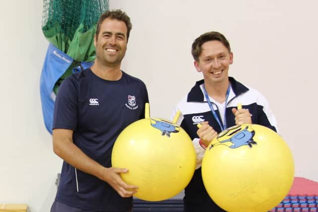 George Vernon, head of year nine, and James Bird, head of tennis, set for their Space Hopper dash
