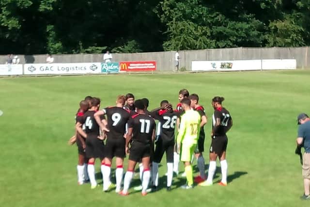 New head coach Harry Kewell gives his half-time team-talk during Crawley Town's pre-season friendly with East Grinstead.
Picture by Graham Carter.