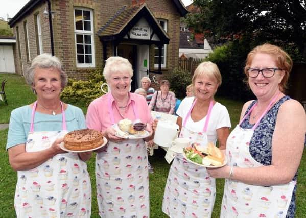 Singleton Village Hall ploughman's Lunch.

Singleton Village Hall supporters help raise money for hall maintenance and facilities by serving ploughman's lunches and cream teas for six consecutive Sundays.

Pictured are L-R Sarah Casdagli, Penny Spence, Jody Fathers and Cathryn Spence. 
Singleton, West Sussex
Picture: Liz Pearce 16/07/2017
LP170205 SUS-170717-075806008
