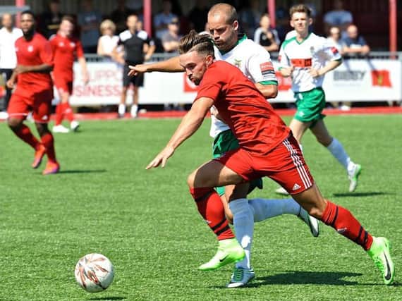 Lloyd Dawes battles for the ball in Saturday's pre-season friendly with Bognor. Picture by Stephen Goodger