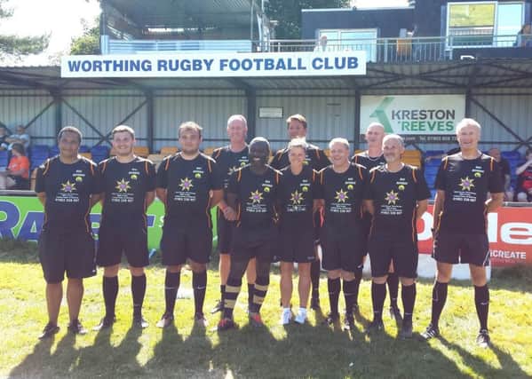 The referees line up before the knockout stage of the tournament in memory of Ryan Chapman