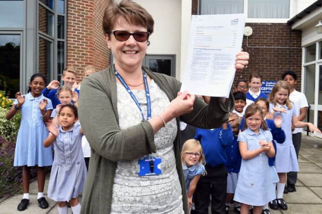 Ofsted Report

St Andrew's CoE Primary School has had a good Ofsted report with, "good"  in every category.

Pictured is Deborah Packham (Head Teacher) with children from reception to year 6. 

Crawley, West Sussex.
Picture: Liz Pearce 11/07/2017
LP170163 SUS-171107-140201008