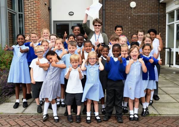 Ofsted Report

St Andrew's CoE Primary School has had a good Ofsted report with, "good"   in every category.

Pictured is Deborah Packham (Head Teacher) with children from reception to year 6. 

Crawley, West Sussex.
Picture: Liz Pearce 11/07/2017
LP170165 SUS-171107-140227008