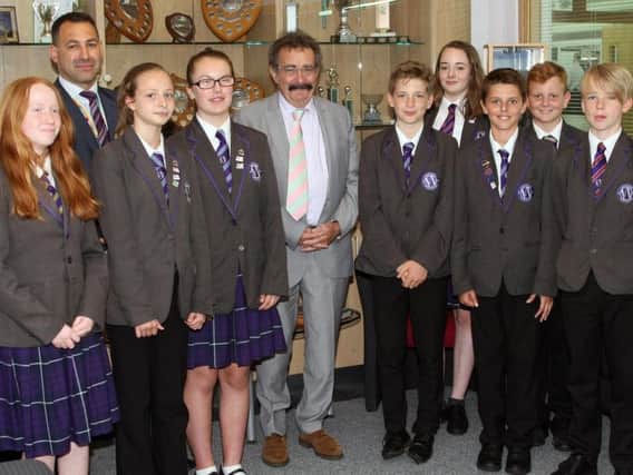 Professor Robert Winston with students from Worthing High School and their headteacher Pan Panayiotou