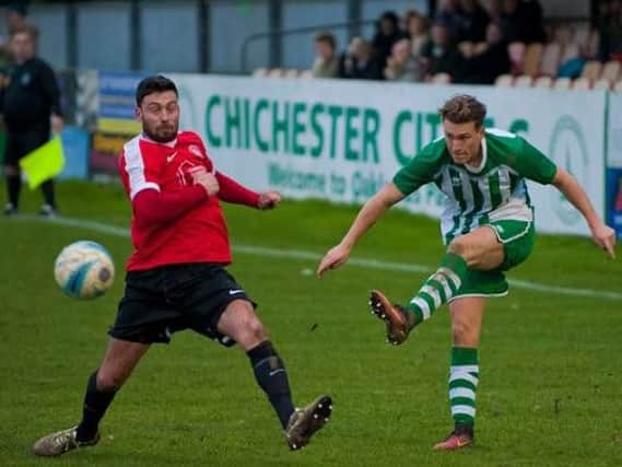 Scott Packer, who was part of last season's SCFL Premier Division title-winning team, has agreed on a return to Shoreham. Picture by Tommy McMillan