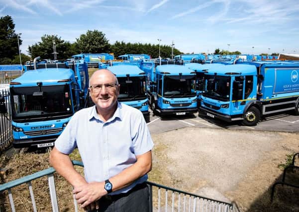Tony Patching, head of the councils' waste management and cleansing service, with the new fleet SUS-170717-122046001