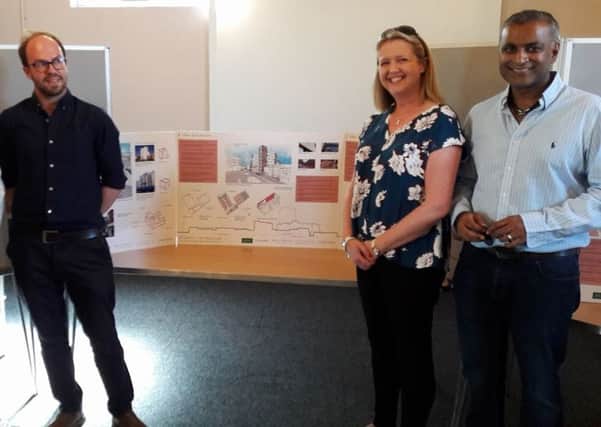 James Howells, Charlotte Grant and premises owner Abhay Varma at the exhibition
